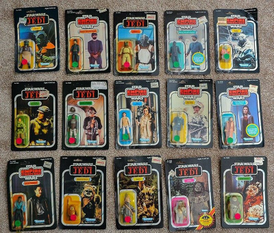 Examples of sealed Star Wars action figures we buy